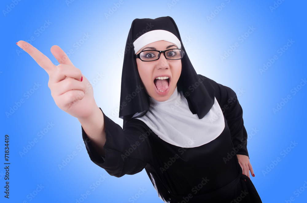 Funny nun isolated on the white Funny nun isolated on the white