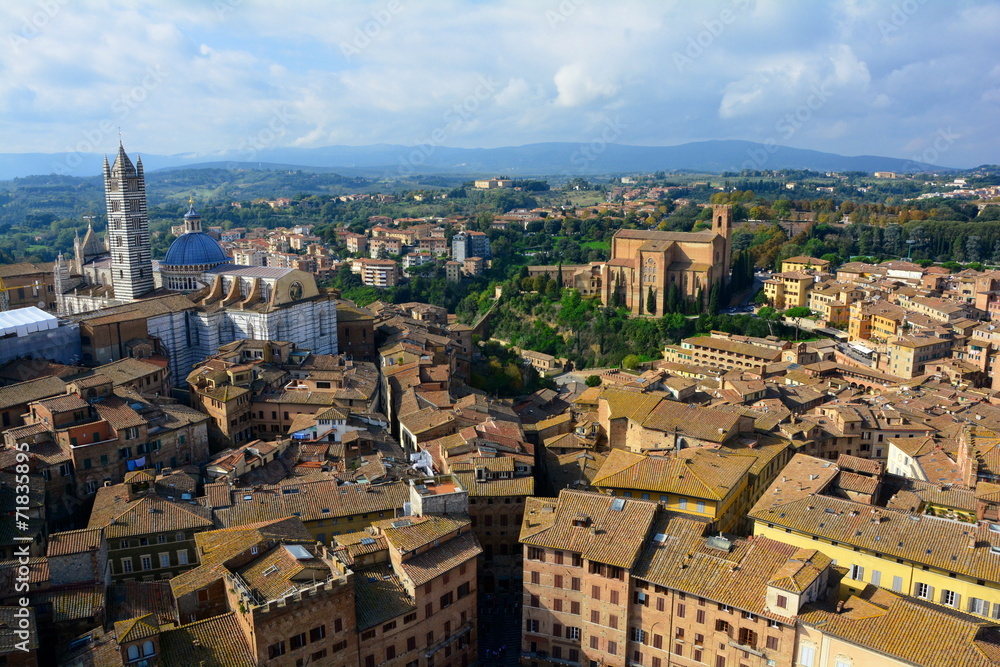 Rooftops and countryside of Siena,Italy.