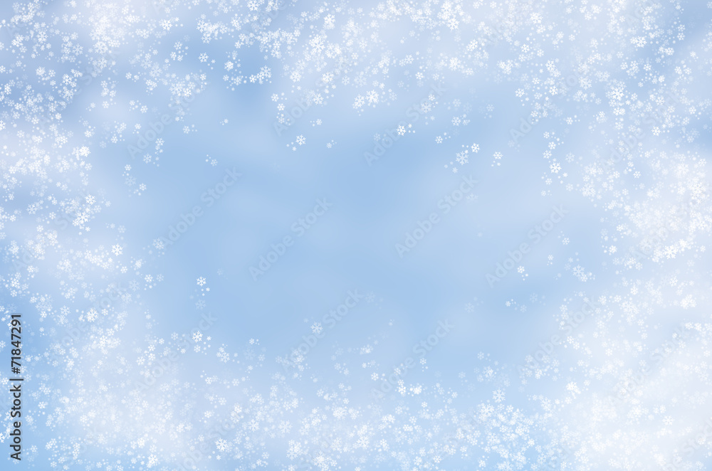 Falling snowflakes on  blue background