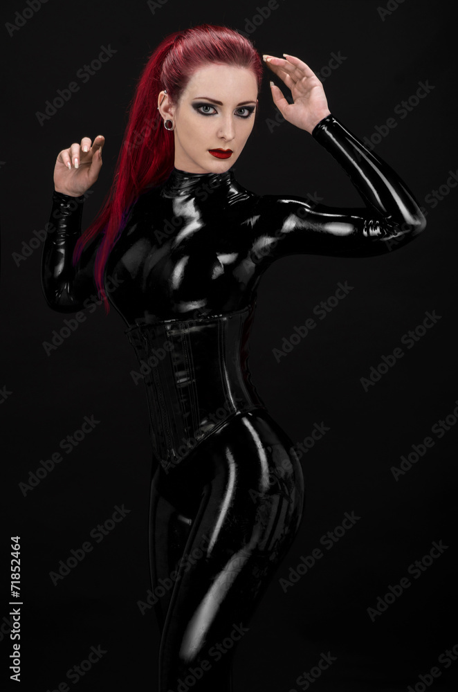 Sexy woman in black latex suit foto de Stock | Adobe Stock