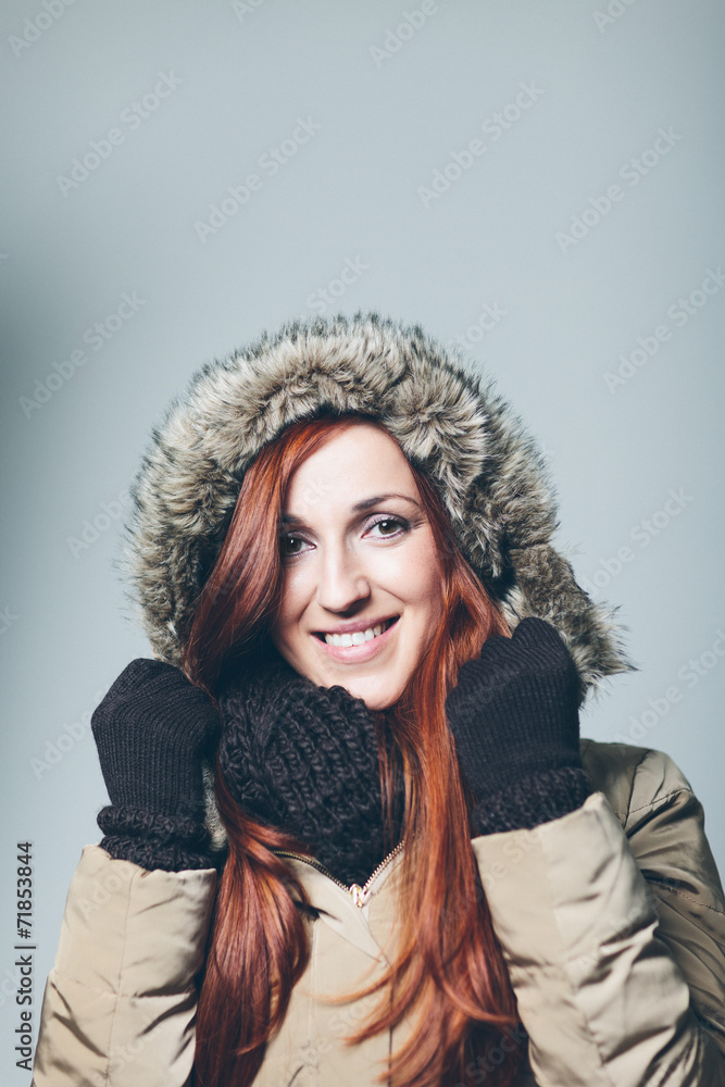 Smiling Woman with Red Hair Wearing Winter Clothes Smiling Woman with Red Hair Wearing Winter Clothes