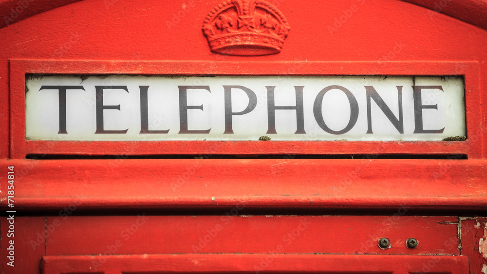 Closeup traditional red telephone box in UK Closeup traditional red telephone box in UK