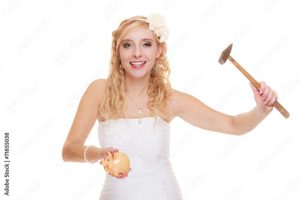 Woman bride with hammer about to smash piggy bank Woman bride with hammer about to smash piggy bank