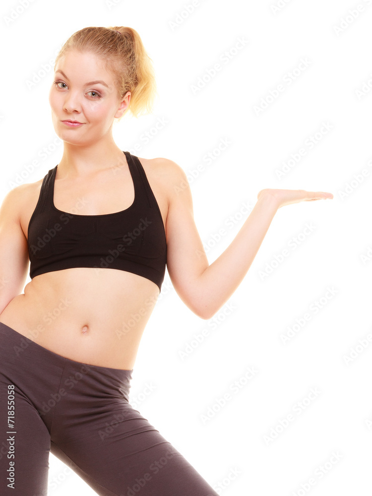 Sport. Fitness sporty girl in sportswear showing copy space Sport. Fitness sporty girl in sportswear showing copy space
