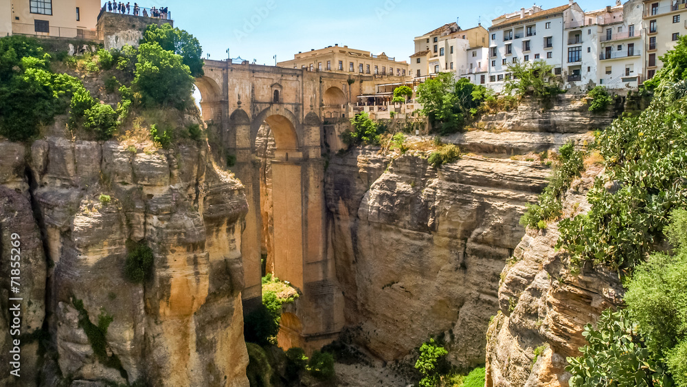 view of buildings over cliff in ronda, spain