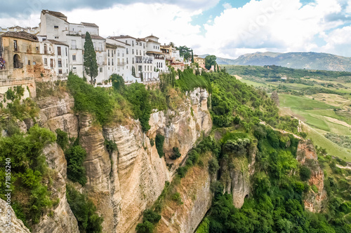 view of buildings over cliff in ronda, spain