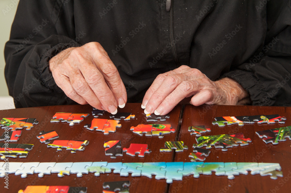 Jigsaw puzzle put together by an eldery woman Jigsaw puzzle put together by an eldery woman
