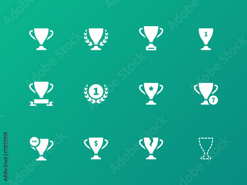 Awards icons on green background.
