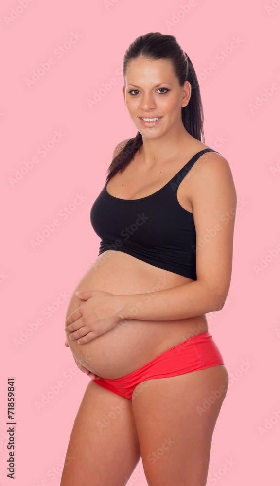 Brunette pregnant woman in underwear Brunette pregnant woman in underwear