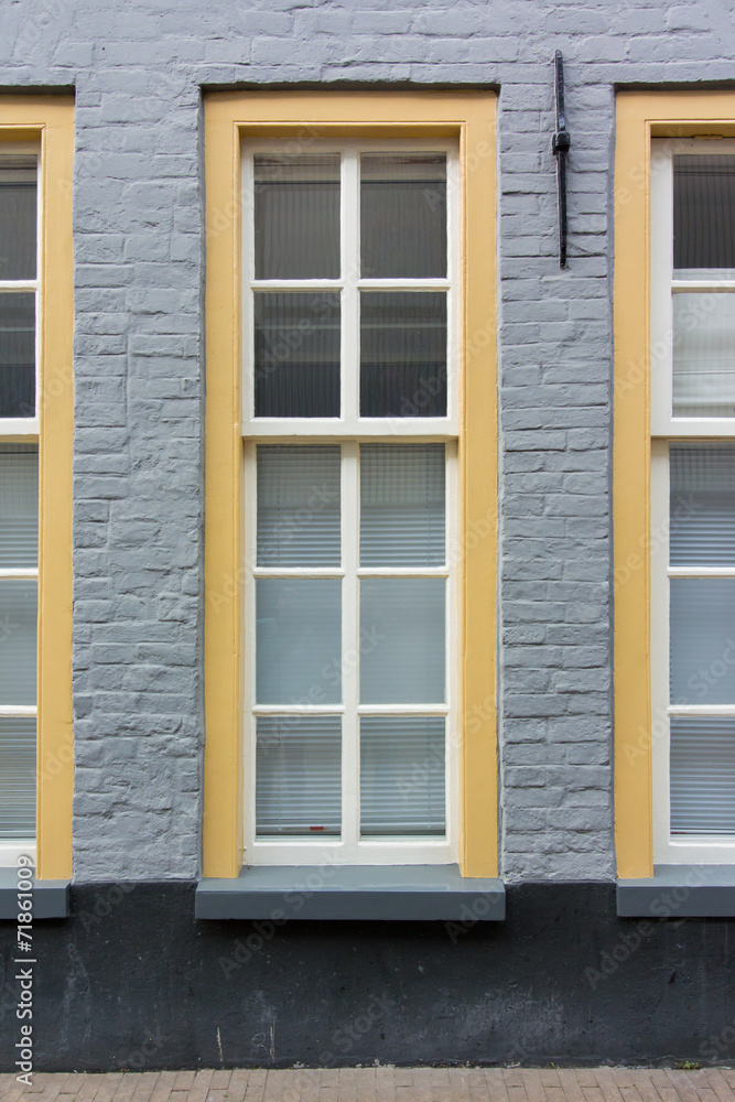 Tall Window on Sidewalk