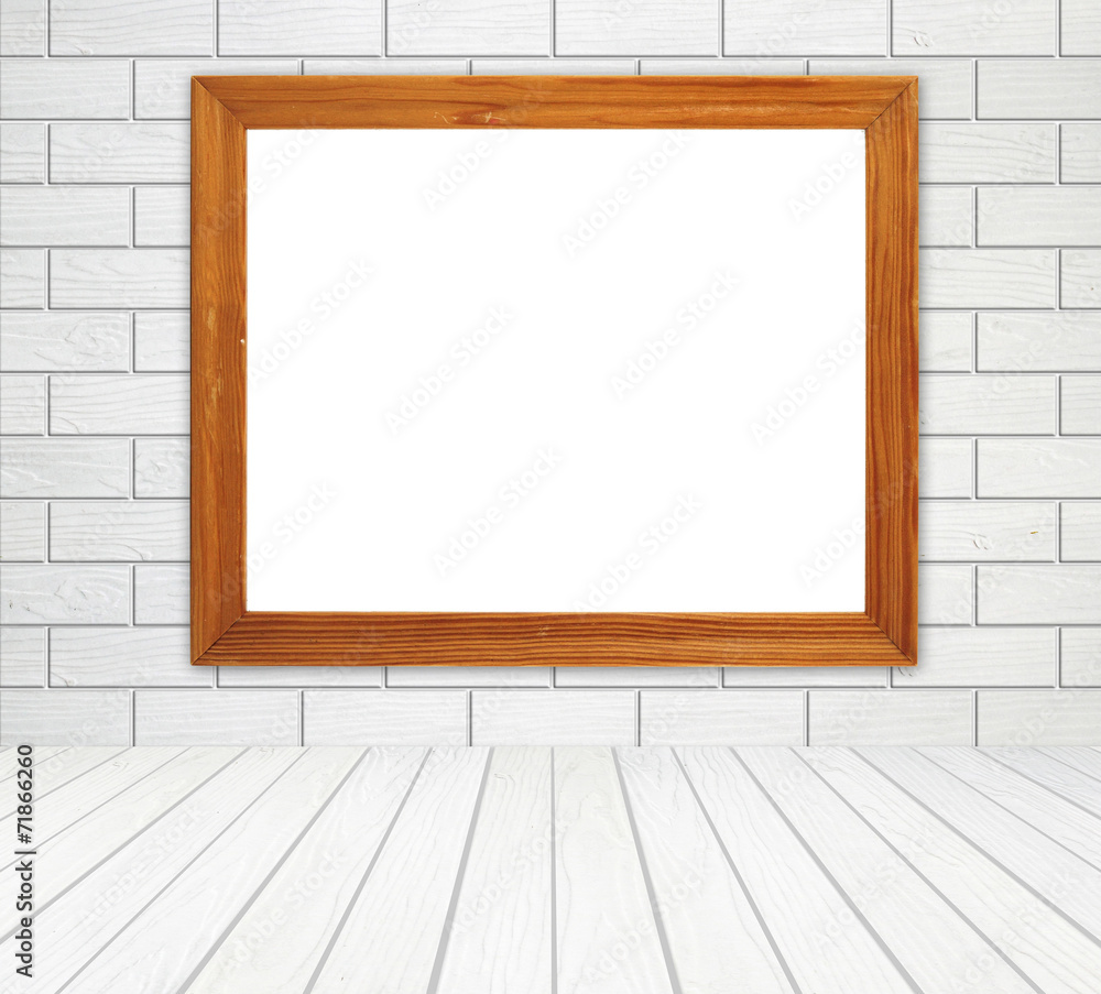 blank wood frame in room with brick wall and wood floor blank wood frame in room with brick wall and wood floor
