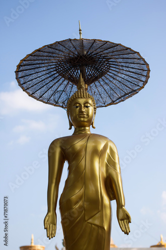 image of buddha made gold color