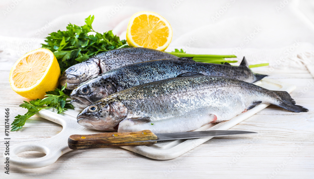River trout with fresh tomatoes, lemon and herbs River trout with fresh tomatoes, lemon and herbs