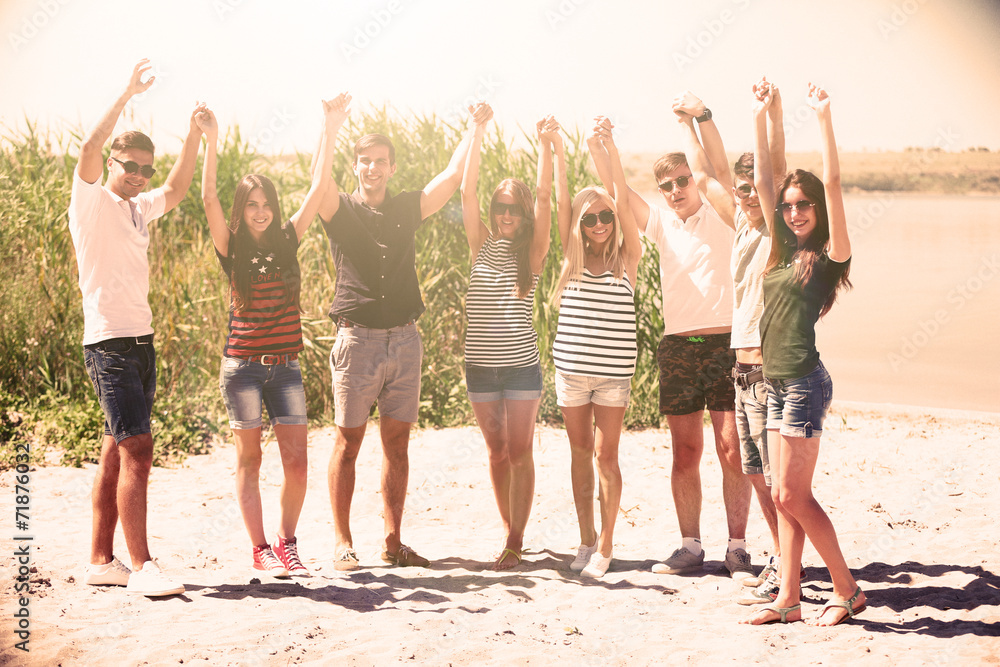 Obraz premium Beautiful young people on beach