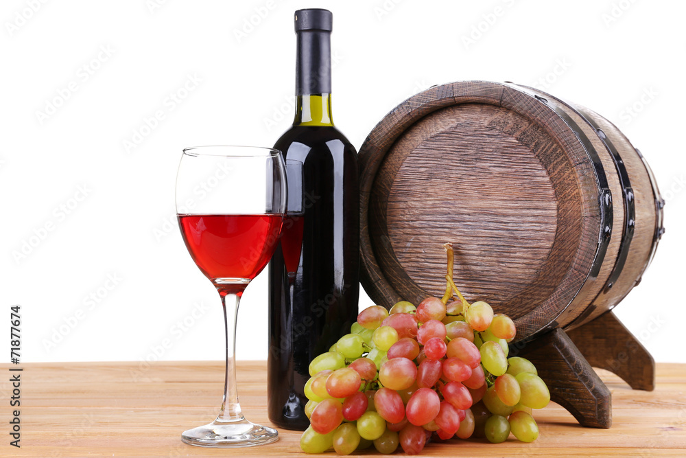 Obraz premium Wine in goblet and in bottle, grapes and barrel