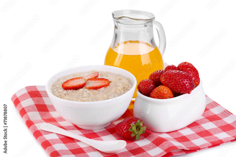 Tasty oatmeal with berries and juice isolated on white Tasty oatmeal with berries and juice isolated on white