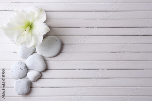 Fototapeta Naklejka Na Ścianę i Meble -  Spa stones on wooden table