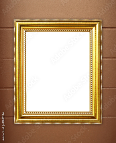blank golden frame on cement wall background