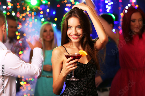 Young people dancing at party