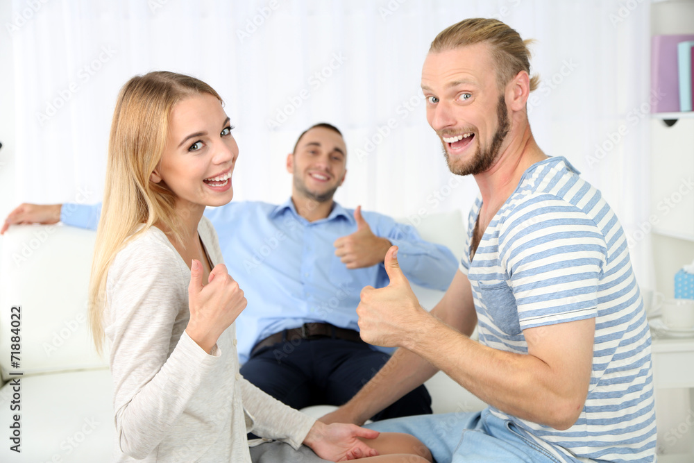 Fototapeta premium Young happy couple after therapy session with family