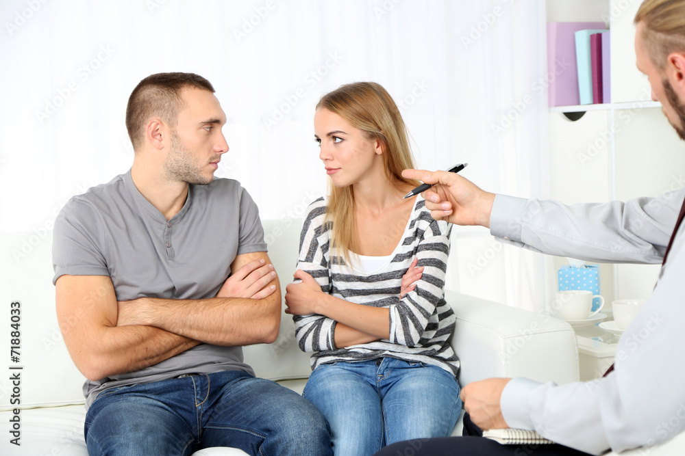 Young couple with problem on reception for family psychologist Young couple with problem on reception for family psychologist