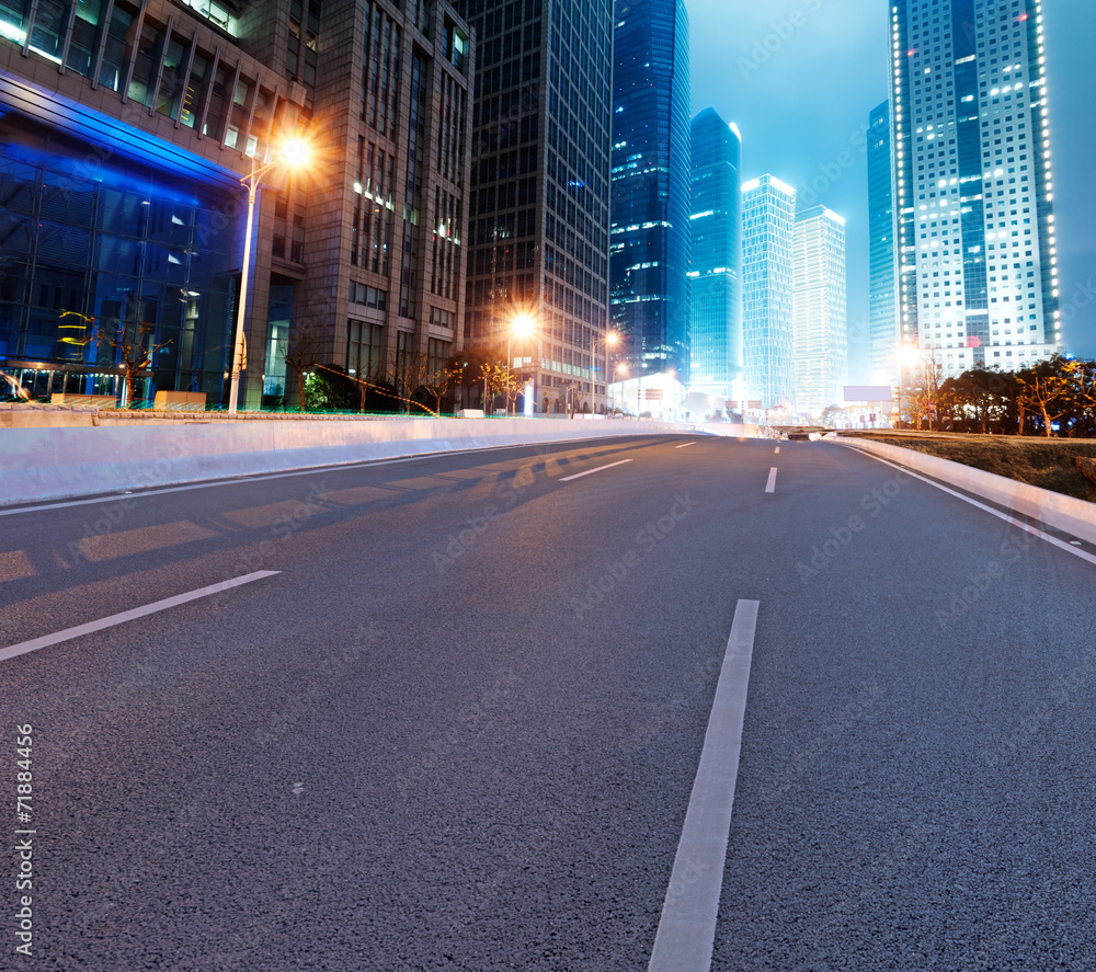 Asphalt road and modern city Asphalt road and modern city