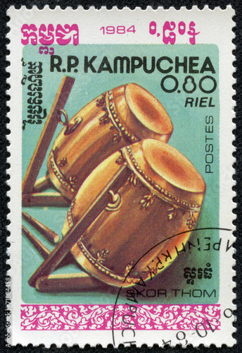 stamp shows a traditional musical instrument Skor thom photo