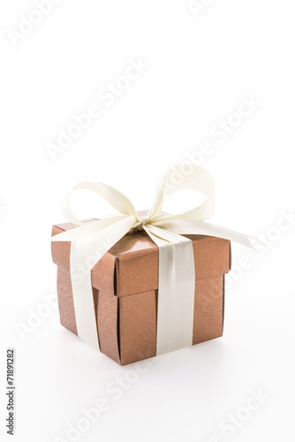Gold gift box isolated on white background