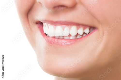 Woman with perfect teeth and beautiful smile.