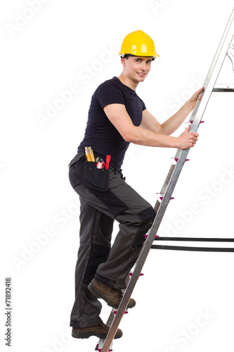 Mechanic climbing a ladder.