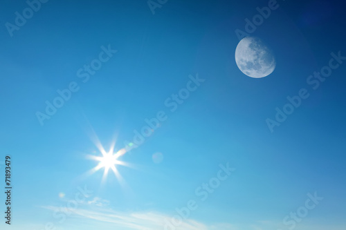 Moon and sun together on sky