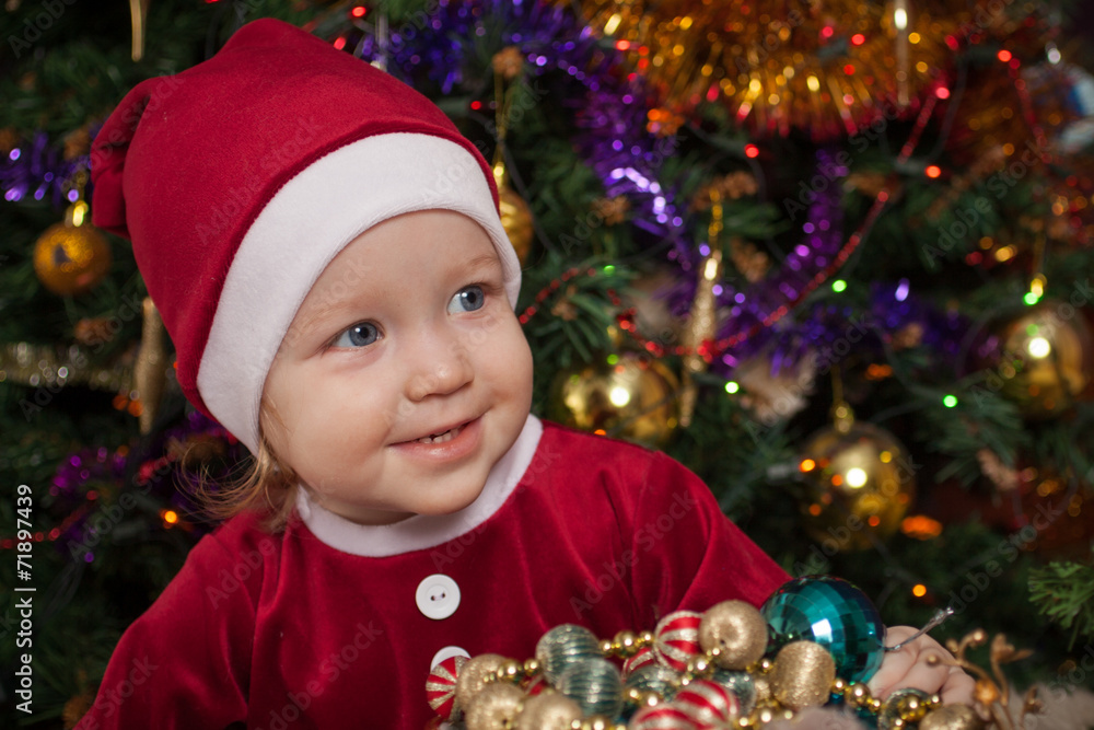 beautiful little girl at a New Year tree