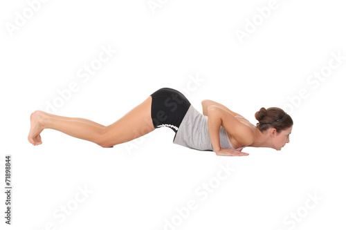 Young woman training yoga
