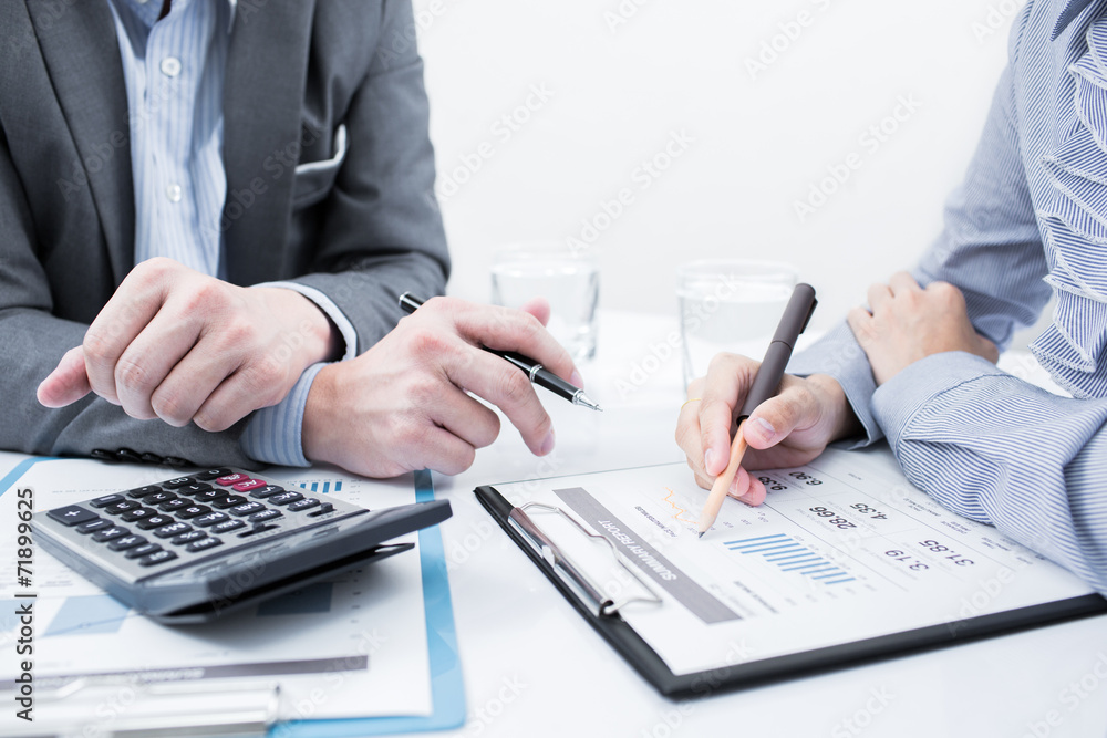 Business people discussing during a meeting Business people discussing during a meeting