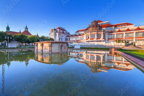 Baltic architecture of Sopot reflected in the fountain, Poland