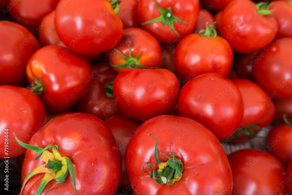 red tomatoes at the market. Fresh ripe tomatoes red tomatoes at the market. Fresh ripe tomatoes