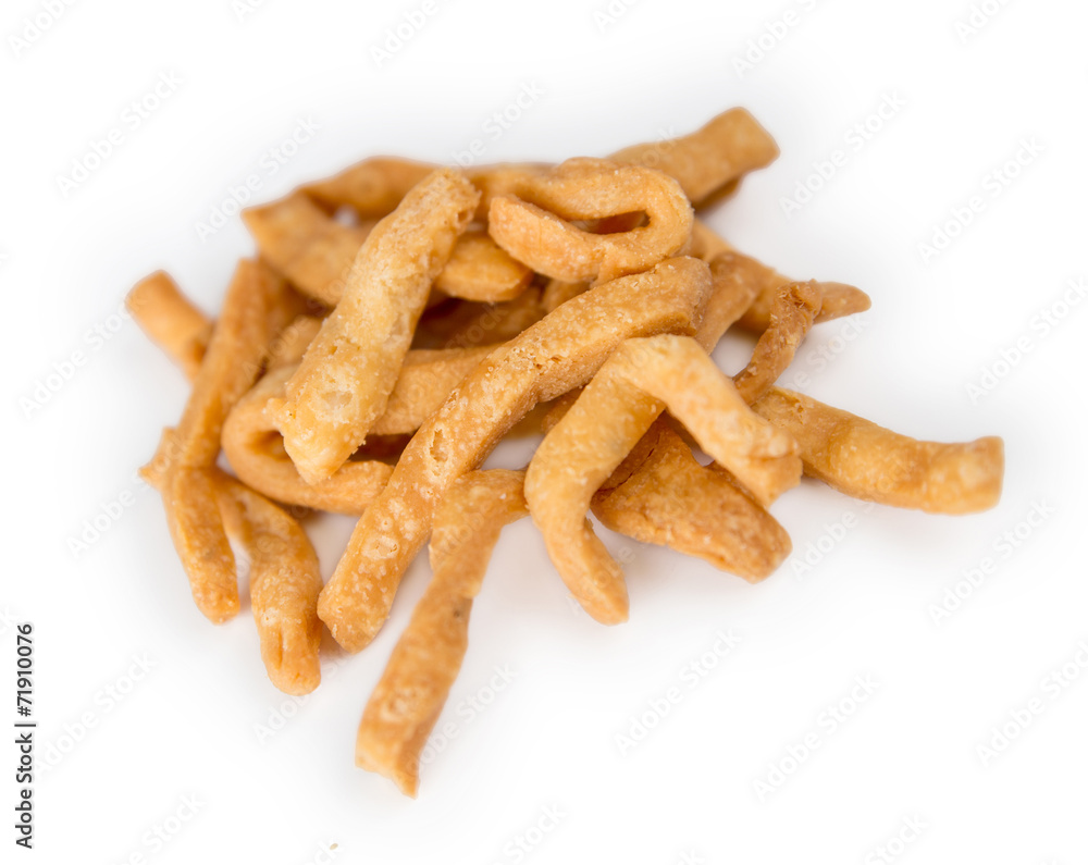 Closeup of Indian matri finger fast food against a white backgro Closeup of Indian matri finger fast food against a white backgro