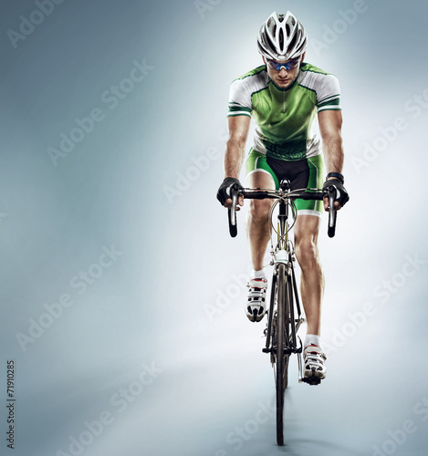 Fototapeta Naklejka Na Ścianę i Meble -  Isolated athletic cyclist. Sport