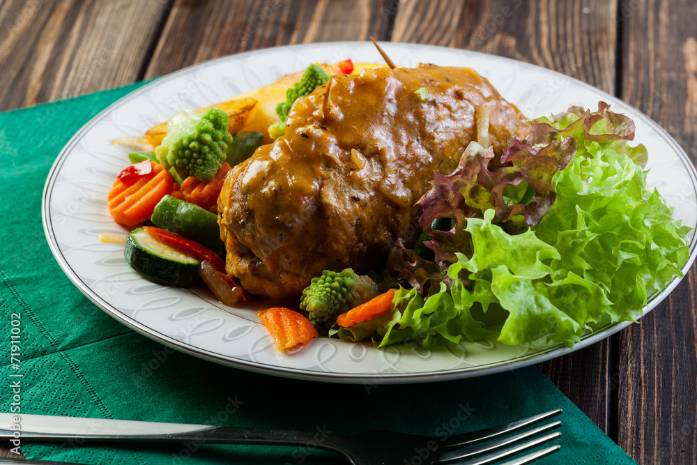 Pork rolls with prepared potatoes and vegetables Pork rolls with prepared potatoes and vegetables