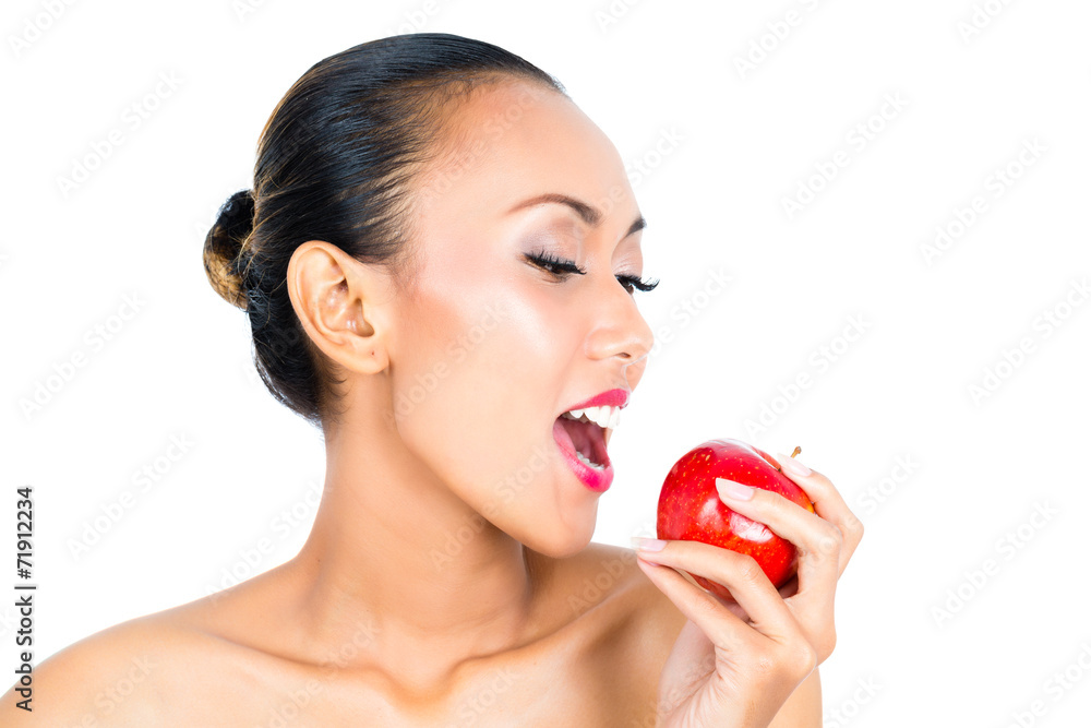 Asian woman eating apple and living healthy Asian woman eating apple and living healthy