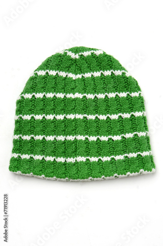 Green knitted wool hat isolated on white background 