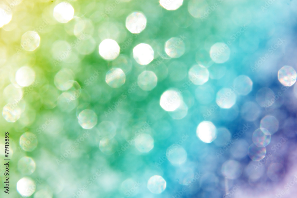 Fototapeta premium Abstract blurred glittering sparkling background. Lights on gold, silver background.