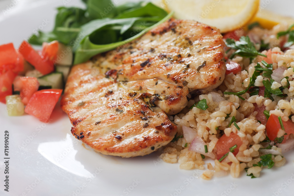 Chicken meat with bulgur and rocket salad Chicken meat with bulgur and rocket salad