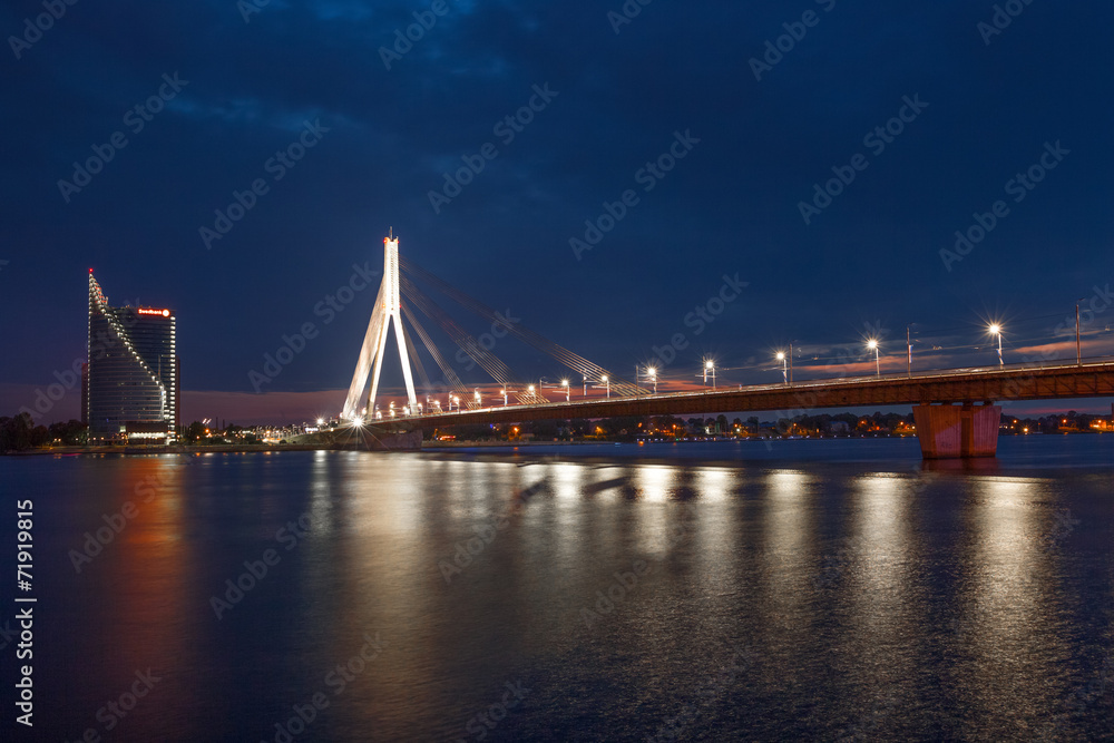 Modern cable bridge over Daugava river in Riga, Latvia