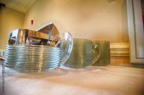 Chafing Dish and glass plates  at buffet photo