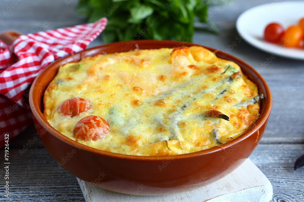 Vegetables baked with cheese in a pan Vegetables baked with cheese in a pan