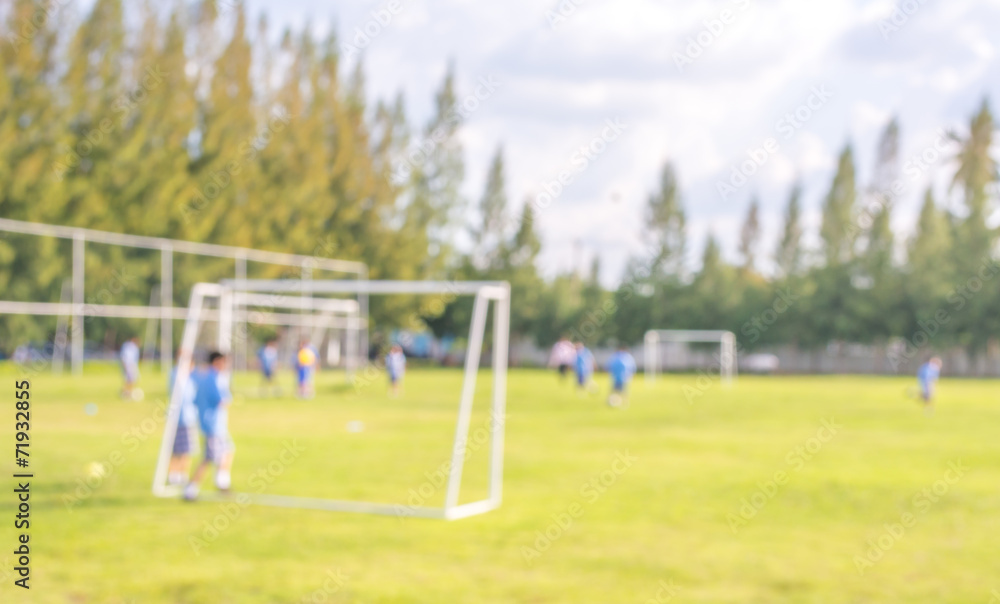 blur shot of soccer field at school on day time image. blur shot of soccer field at school on day time image.