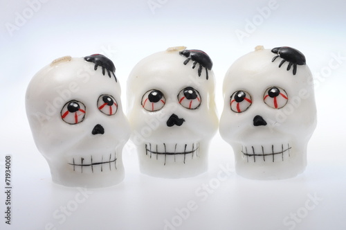 Halloween skulls on light background