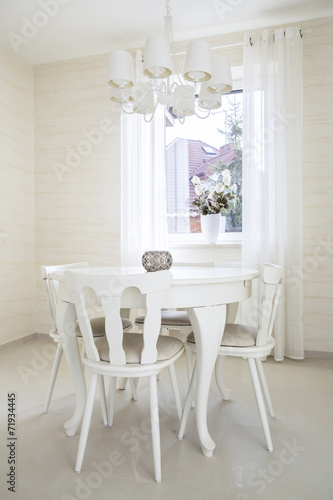 Fototapeta Naklejka Na Ścianę i Meble -  Vertical view of classic table with chairs
