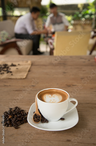cup of coffee on table in cafe